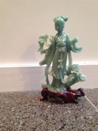 Jade Statue has repaired crack in the neck.