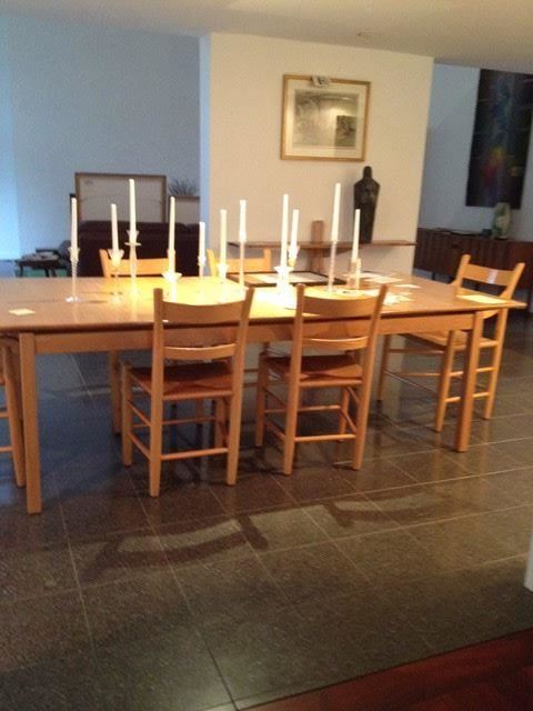Large solid wood hand made table with hand made cain high back chairs