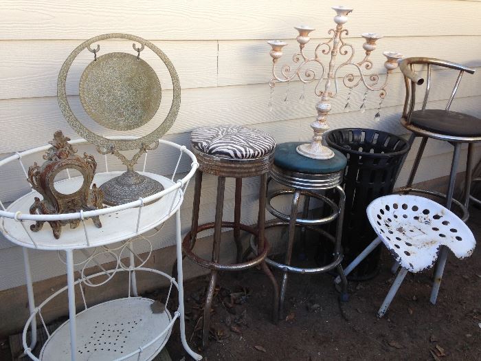 Stools:  $19.50ea.  Candle Aubrey:  $57.00.  Tractor Seat:  $12.00.  Black Stools:  $45.00pr.