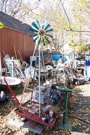 Windmill:  $60.00.  Green Iron Stool:  $39.00.  Large Windmill is SOLD