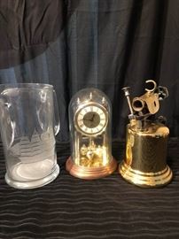 Encased clock, vintage cap sprayer and pitcher