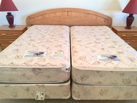 King Oak Wood-grain Headboard, 2 Twin Simmons "Bristol" Mattress/Springs, 2 Oak Wood-grain Nightstands