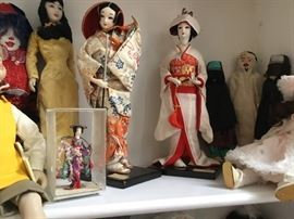 Oriental dolls and a Middle Eastern trio.