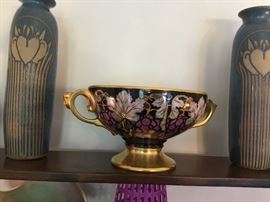 Center bowl with a pair of pottery vases.