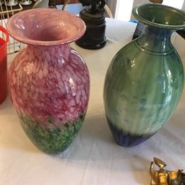 Large blown glass vase and a crystalline glaze pottery vase.