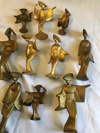 Cast iron and gilded oriental ladies.