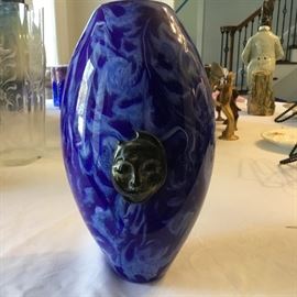 Phenomenal blown glass vases with a face. Signed.