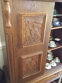 German vintage carved blind china cabinet.