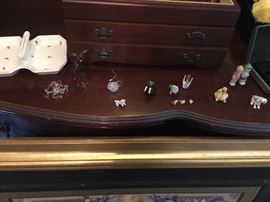 Hard to see, collection of vintage animals and Murano blown glass animals.