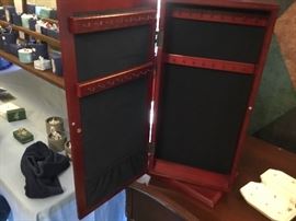 Tabletop jewelry cabinet.