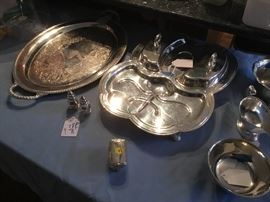 Unusual silver plate meat tray with two lidded condiment islands, plus a large two handled silver plate tray.