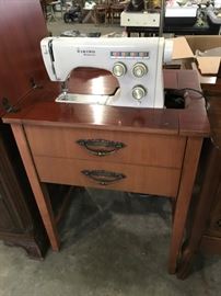Viking Husqvarna sewing machine with cabinet.