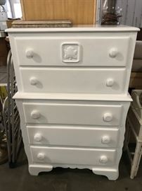 White chest of drawers.