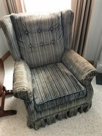 Pair of matching upholstered easy chairs and ottoman.