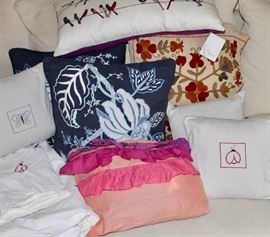 Pottery Barn embroidered pillows and duvet; Anthropology shower curtain.