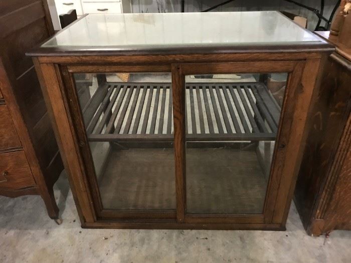 Antique display case with original shelf, possibly for a baker.