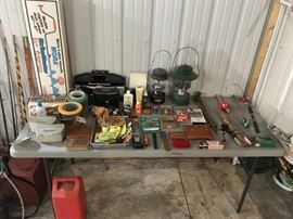 Nice selection of fishing poles, accessories and camping gear.