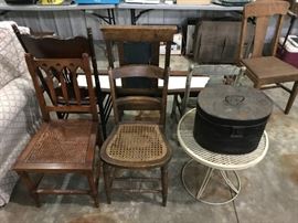 Many pieces of small antique furniture, including many chairs.