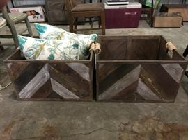 Sturdy painted wooden crates.