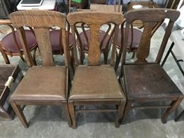 Three of the 20-25 antique chairs at this sale.