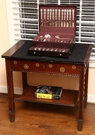 Antique table with inlay and set of Rondo sterling.