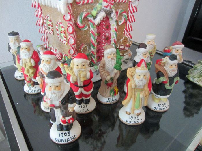 Santa figures showing suits of various countries