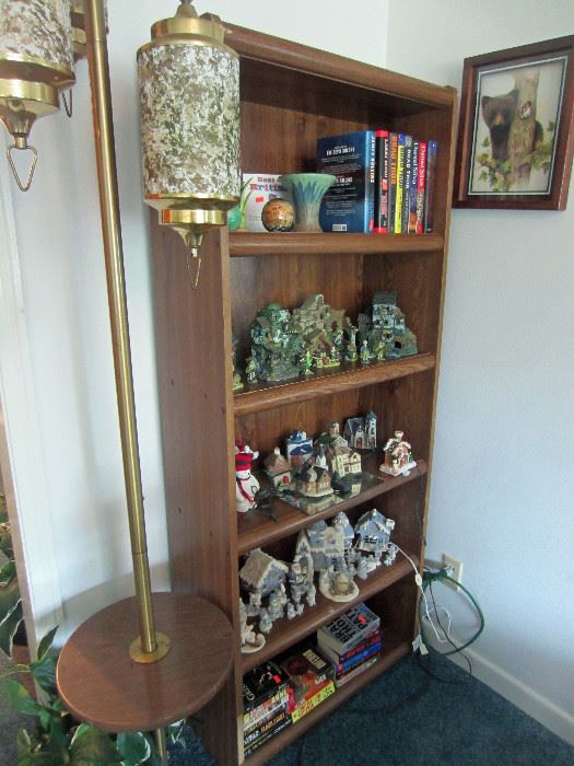 Vintage pole lamp and bookcase full of ceramics and books