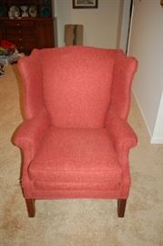 High back cushioned chair