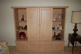 Entertainment center - sliding doors, shelving, lower storage cabinets