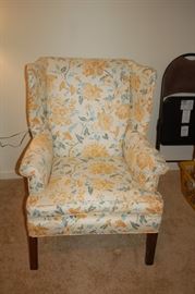 Floral, cushioned high back chair