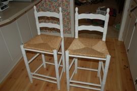 Pair of tall bar stools/weaved bottom