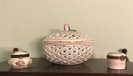 Close-up of ring boxes and covered dish