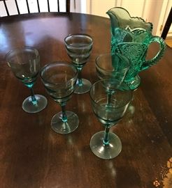 Teal cut glass pitcher and wine glasses