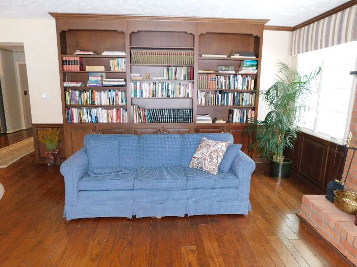 Well made sofa covered by Paul's Upholstery.  Sets of vintage books.