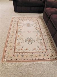 Very nice cotton rug in earth tones
