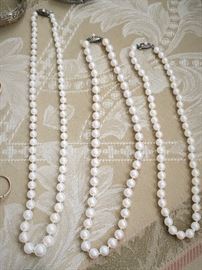 Three stands of genuine, quality Akoya pearls purchased in Japan between 1956-1959.  