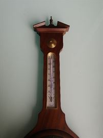 Mahogany Barometer; Made in Germany; Marked "Jason"; Displays Humidity, Temperature (F), & Weather on a Scale of Stormy to Dry; 9"W x 1"D x 28"H; $50; ref #: 18787