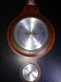 Mahogany Barometer; Made in Germany; Marked "Jason"; Displays Humidity, Temperature (F), & Weather on a Scale of Stormy to Dry; 9"W x 1"D x 28"H; $50; ref #: 18787