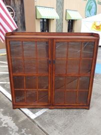 Sedona Bookcase; Glass Doors; 4 Storage Compartments; Retails at $799; Made by Hammary Furniture; 63"W x 14"D x 60"H; $400; ref #: 904