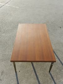 Low Lying Coffee Table; Plain Top; Brass Colored Legs; 51"W x 32"D x 17"H; $80; ref #: 926