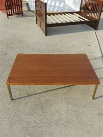 Low Lying Coffee Table; Plain Top; Brass Colored Legs; 51"W x 32"D x 17"H; $80; ref #: 926