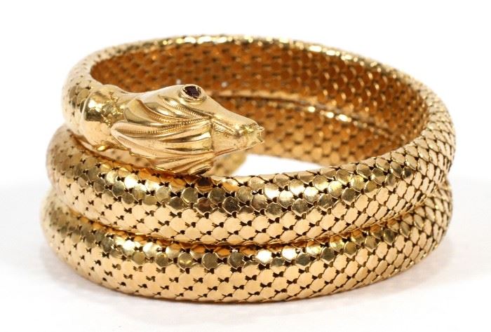COILED SNAKE, 18KT YELLOW GOLD AND SAPPHIRE BRACELET, 56.9 GR.
Lot # 0019 