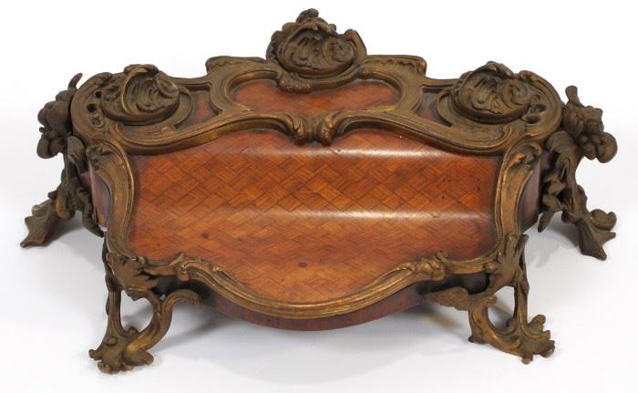 FRENCH ROCOCO, BRONZE, ROSEWOOD AND MARQUETRY LOUIS XV 18TH.C. INK STAND H 5" W 15"
Lot # 1131