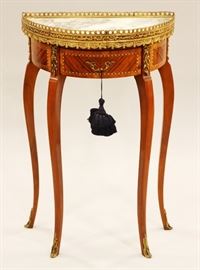LOUIS XV STYLE DEMI LUNE MARBLE TOP AND BRONZE ORMOLU TABLE, H 29 1/2", L 18 1/2"
Lot # 1160 