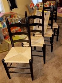 Set of four black cain chairs