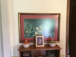 one of many framed art pieces