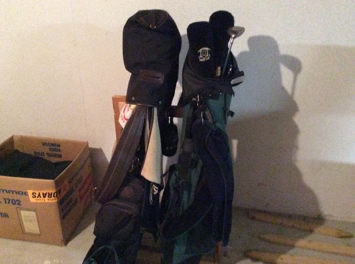 2 full sets of golf clubs