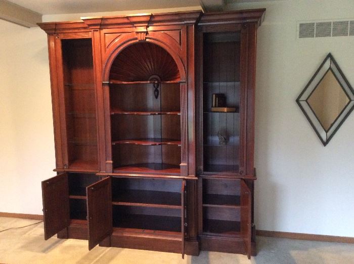 High end library display. Solid wood, pristine condition. Top separates from the bottom for moving. Owners paid $6000.00 in 2004.
