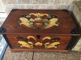 Pine chest with tole painted floral design.