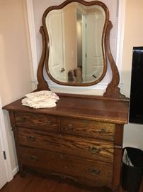Antique oak dresser with wishbone mirror.
